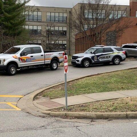 Police vehicles outside Eastern High School after gun found there on Jan. 23, 2023